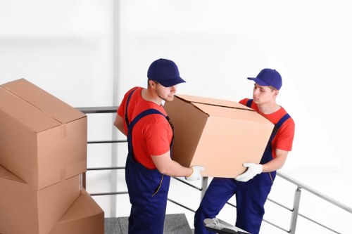 Man with van loading furniture in Chelsfield