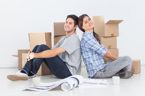 Packed office boxes and workstation equipment ready for relocation