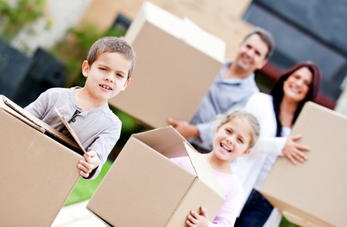 Packed boxes and furniture ready for transport during a local move