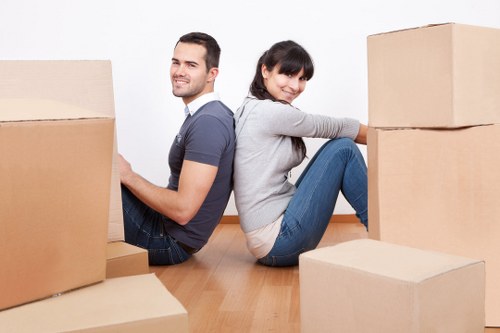 Furniture being carried through a residential property during a move